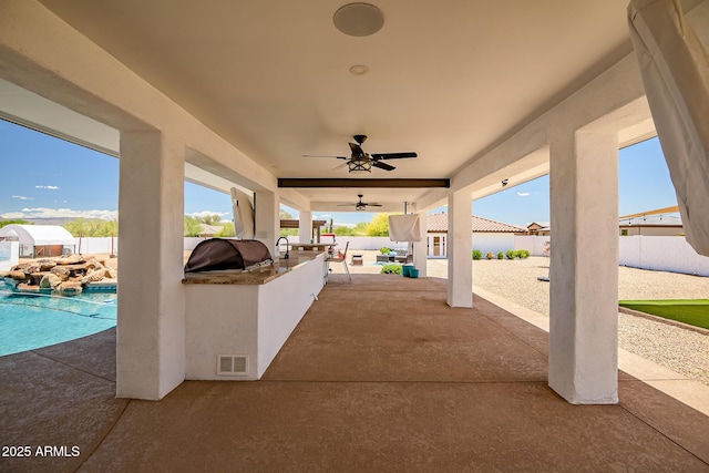 35005 N Central Ave, Phoenix, AZ 85086 - view of patio with area for grilling, a fenced backyard, and ceiling fan