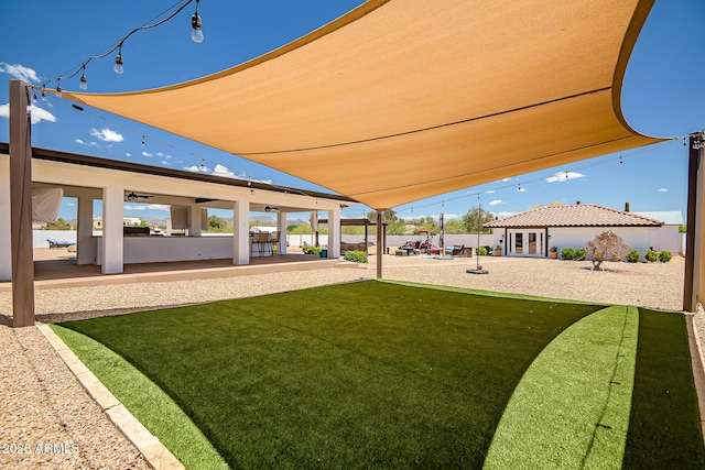 35005 N Central Ave, Phoenix, AZ 85086 - view of green lawn with a patio and an area to practice putting