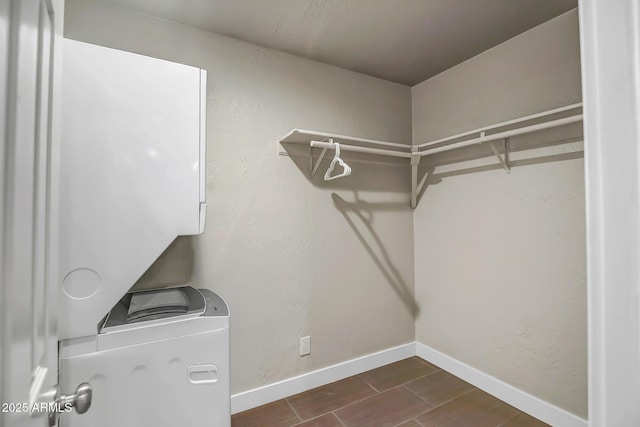 35005 N Central Ave, Phoenix, AZ 85086 - washroom featuring baseboards and stacked washing machine and dryer