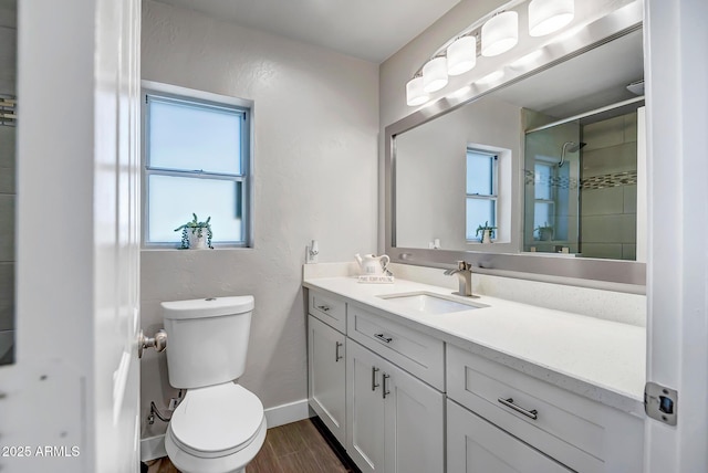 35005 N Central Ave, Phoenix, AZ 85086 - full bathroom with toilet, a stall shower, wood finished floors, vanity, and baseboards
