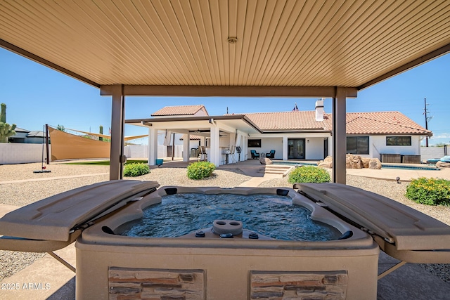35005 N Central Ave, Phoenix, AZ 85086 - view of patio with a hot tub and a ceiling fan