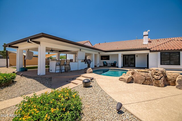 35005 N Central Ave, Phoenix, AZ 85086 - outdoor pool featuring a patio, a ceiling fan, and french doors