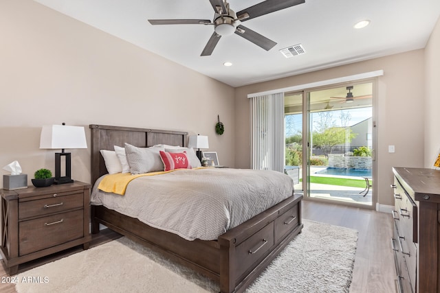 bedroom with access to outside, light hardwood / wood-style flooring, and ceiling fan