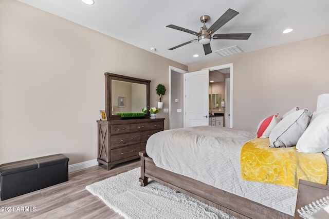 bedroom featuring ceiling fan and light wood-type flooring