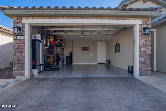 garage featuring a garage door opener