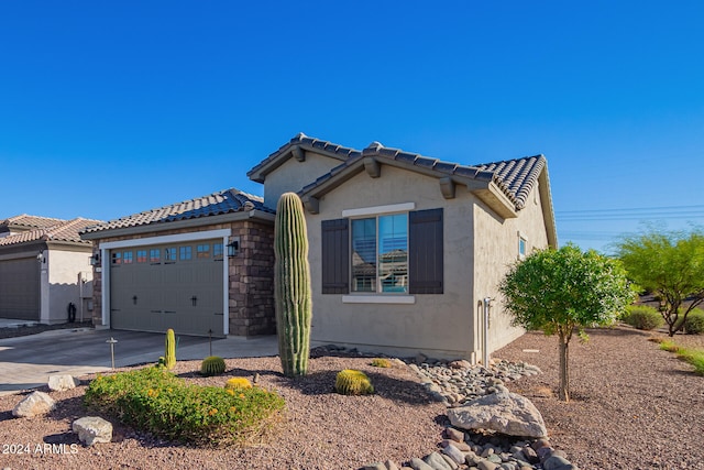 view of front of property featuring a garage