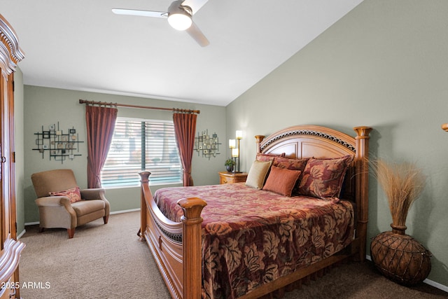 carpeted bedroom with baseboards, a ceiling fan, and vaulted ceiling