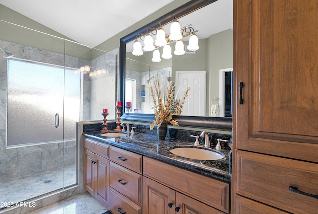 full bathroom with lofted ceiling, double vanity, a stall shower, and a sink