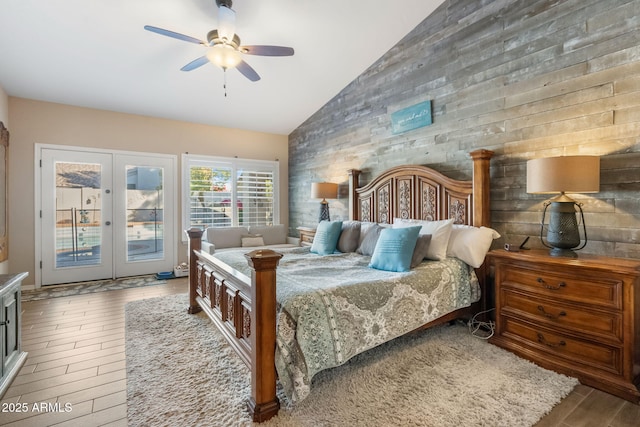 bedroom with french doors, high vaulted ceiling, access to outside, hardwood / wood-style flooring, and ceiling fan