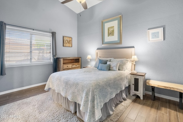 bedroom with ceiling fan and vaulted ceiling