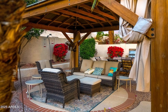 view of patio with a gazebo and outdoor lounge area