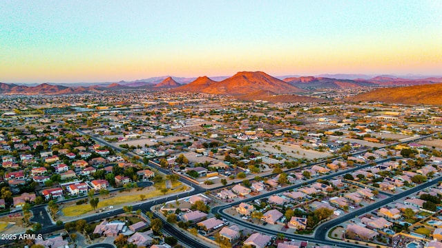 aerial view at dusk with a mountain view