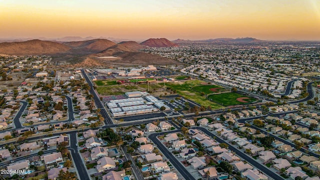 aerial view at dusk with a mountain view