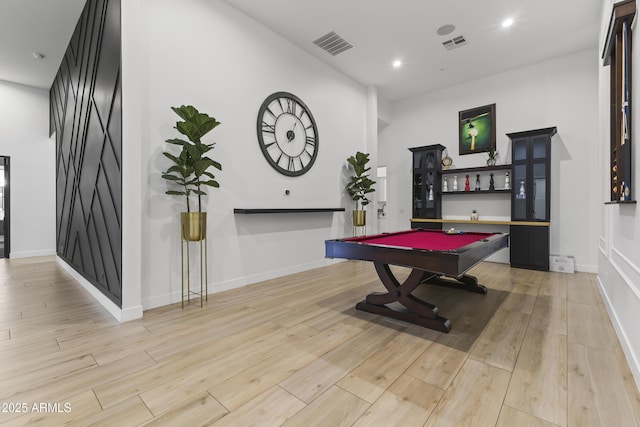 rec room featuring billiards and bar area