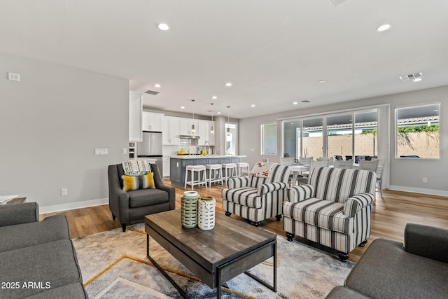 living room with light wood-type flooring