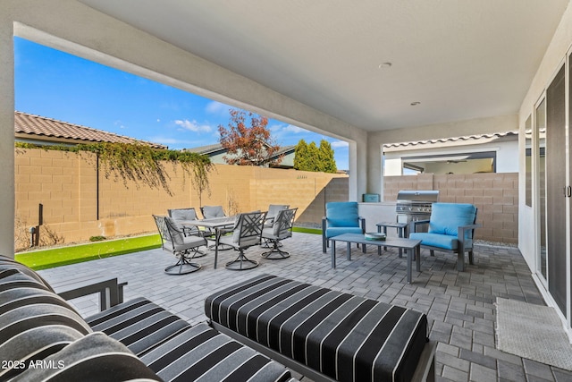 view of patio / terrace with a grill and exterior kitchen