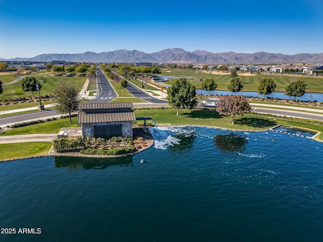 bird's eye view featuring a water and mountain view