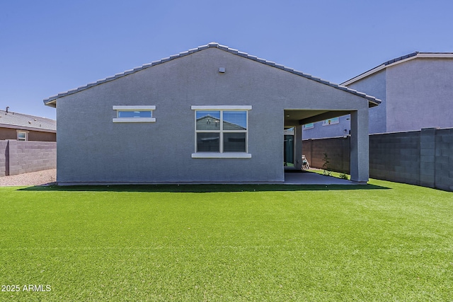 back of house featuring a patio and stucco siding