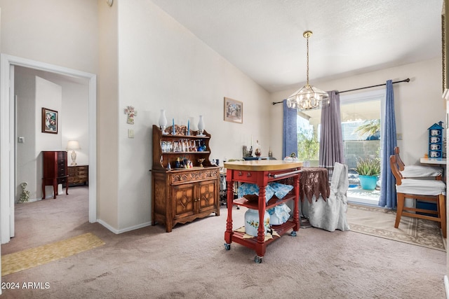 carpeted dining space with high vaulted ceiling and an inviting chandelier