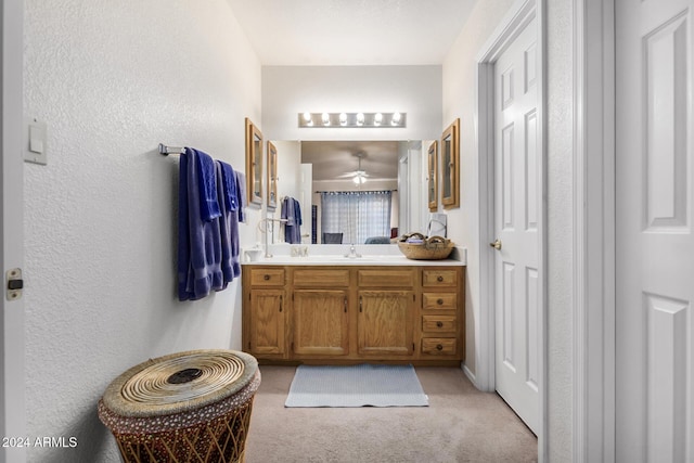 bathroom featuring vanity and ceiling fan