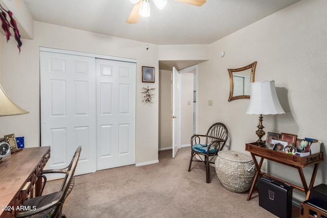 home office with ceiling fan and light colored carpet