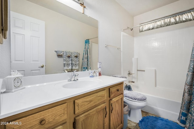 full bathroom with shower / bath combo with shower curtain, vanity, and toilet