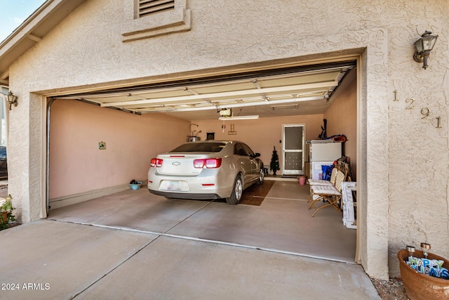 garage featuring a garage door opener