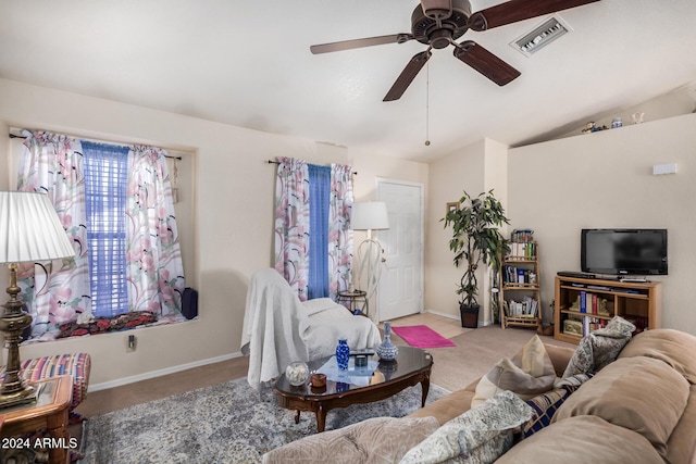 living room with light carpet, vaulted ceiling, and ceiling fan