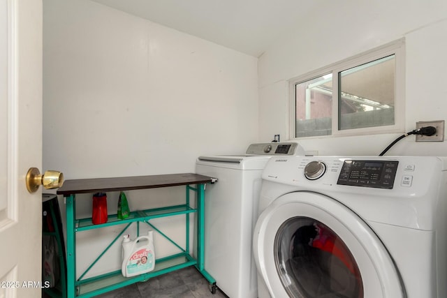 washroom with washer and clothes dryer