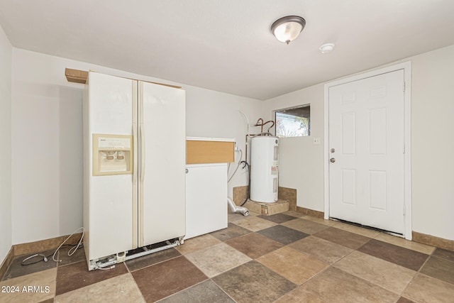 foyer entrance featuring water heater