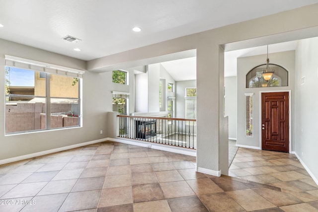 entrance foyer featuring tile patterned flooring, recessed lighting, baseboards, and visible vents