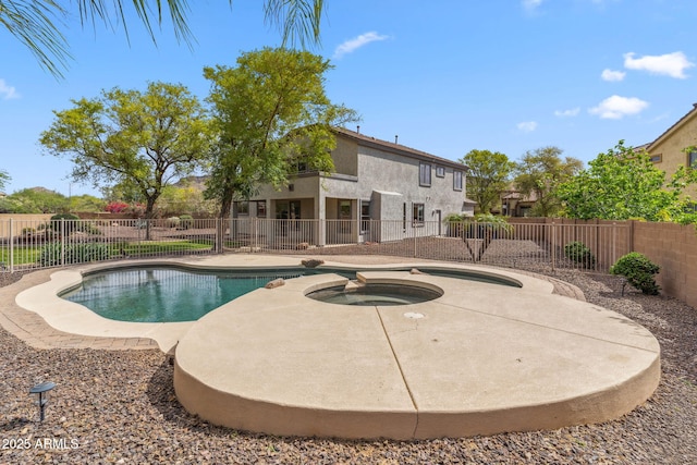 view of swimming pool featuring a patio, a fenced in pool, a fenced backyard, and an in ground hot tub