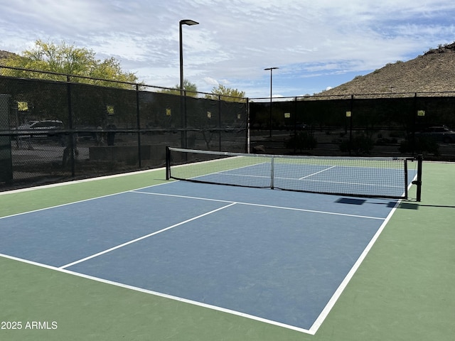 view of sport court with fence and community basketball court