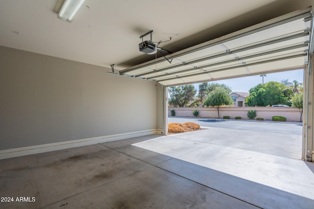 garage featuring a garage door opener