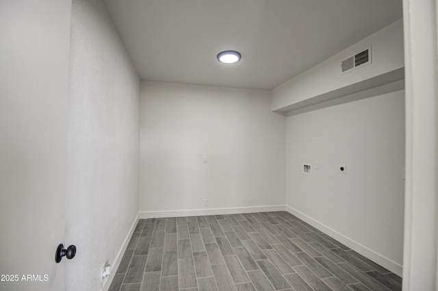 interior space with visible vents, baseboards, and dark wood-style flooring