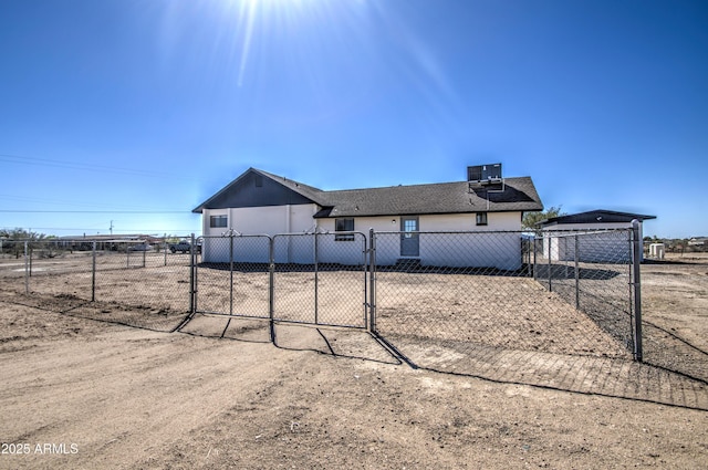 view of front facade featuring a gate and fence private yard