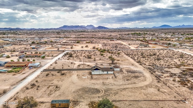 aerial view with view of desert, a rural view, and a mountain view