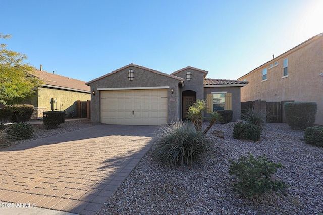 view of front of property with a garage