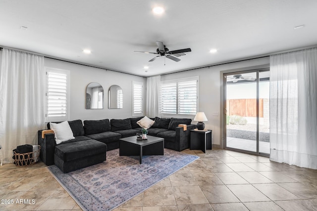 living area with light tile patterned floors, recessed lighting, and ceiling fan