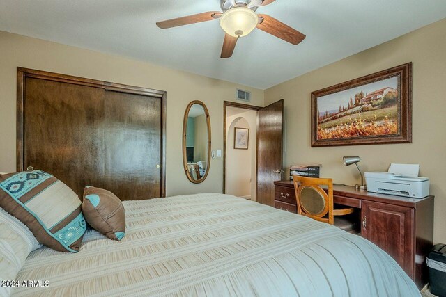 bedroom with a closet and ceiling fan