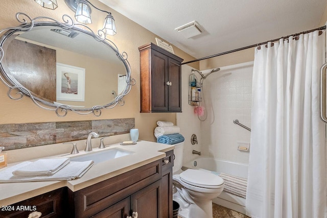 full bathroom with a textured ceiling, vanity, toilet, and shower / bathtub combination with curtain