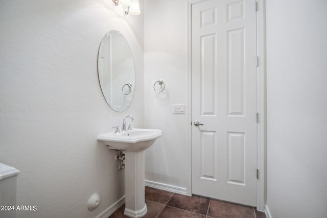 bathroom with tile patterned flooring