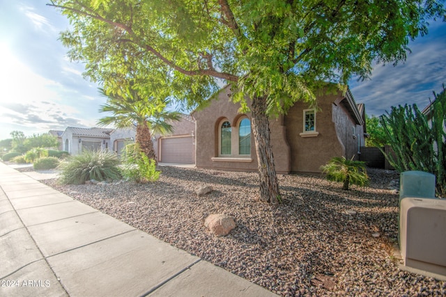 view of front of house with a garage