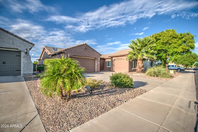 view of front of property with a garage