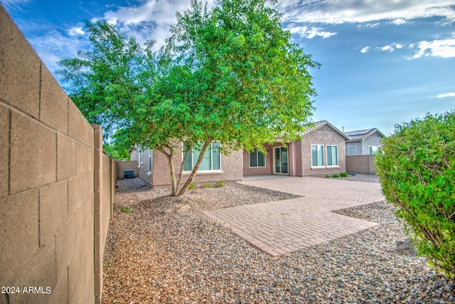 rear view of property with a patio