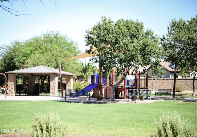 view of jungle gym featuring a gazebo and a lawn