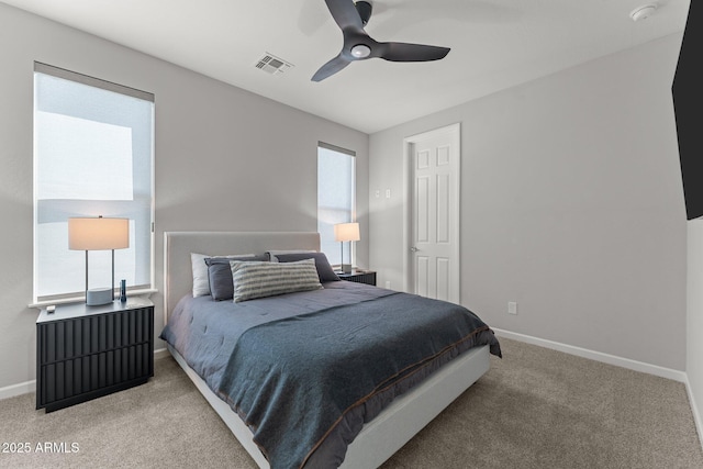 3326 Josey Wales Way, Wickenburg, AZ 85390 - bedroom with light carpet, baseboards, and ceiling fan
