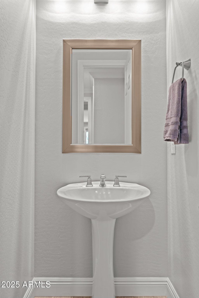 3326 Josey Wales Way, Wickenburg, AZ 85390 - bathroom featuring baseboards