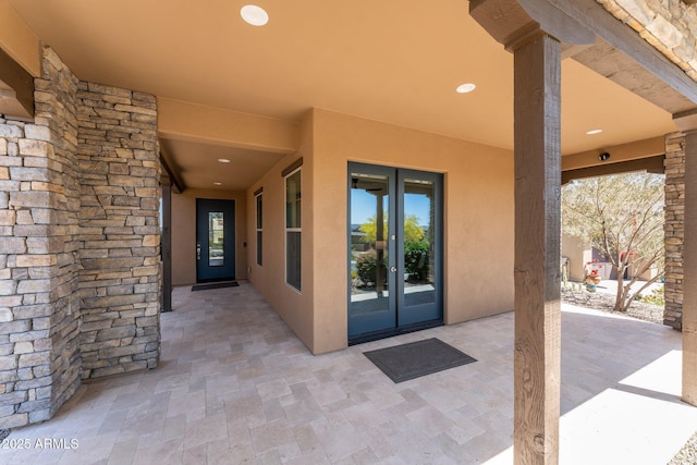 3326 Josey Wales Way, Wickenburg, AZ 85390 - entrance to property featuring french doors, stucco siding, and a patio area