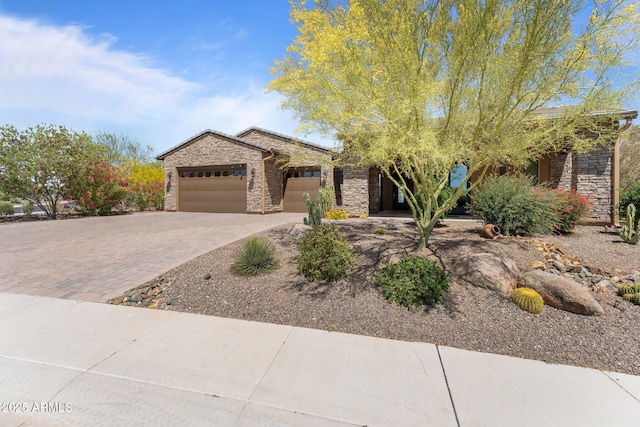 3326 Josey Wales Way, Wickenburg, AZ 85390 - single story home with stone siding, a garage, and decorative driveway